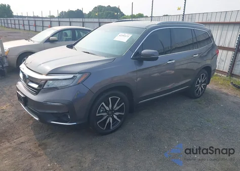 2019 Honda Pilot Touring z USA, uszkodzony, nr VIN 5FNYF5H93KB028641